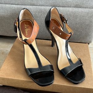 Cole Haan Nike Air. Size 9B. Black patent leather sandal with brown strap